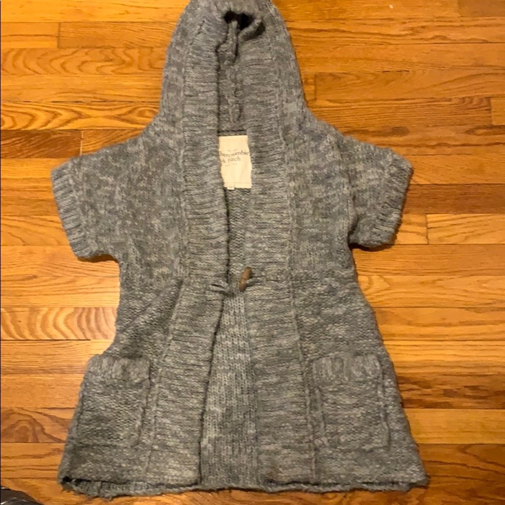 Knitted vest w/ hood